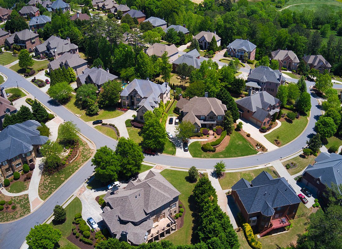 Cumming, GA - Aerial View of Residential Homes in Cumming, GA on a Sunny Day